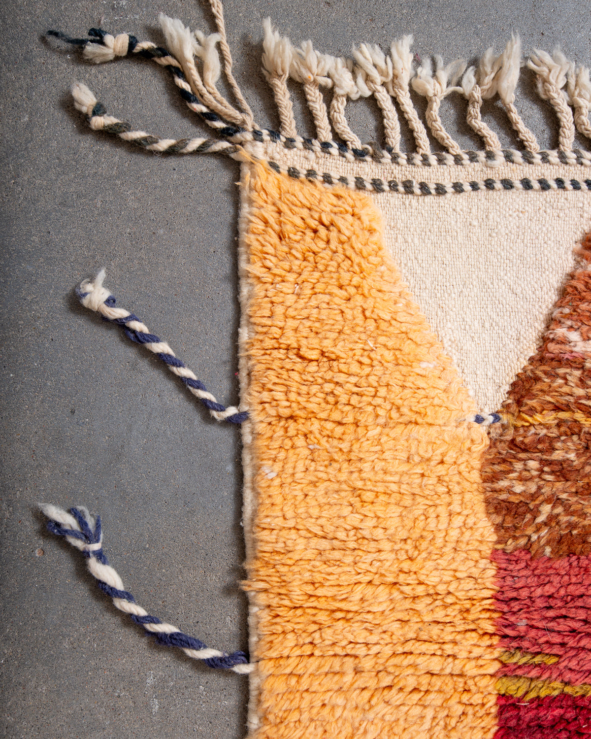 Modern, designer, handcrafted Berber rug from Morocco. Beniourain carpet with beautiful colours and patterns and fluffy wool texture.